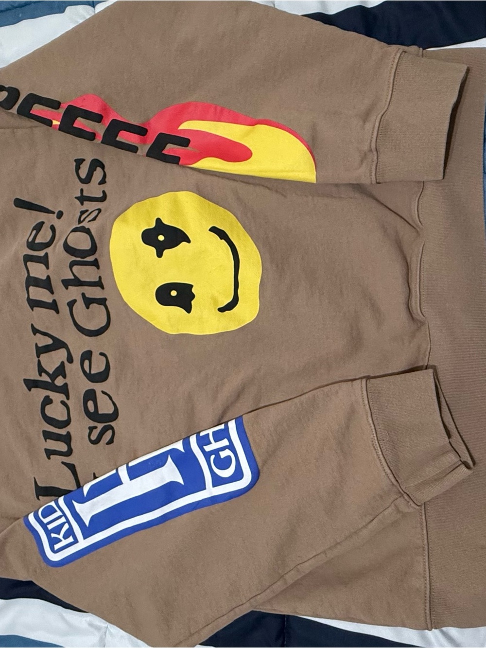 Brown Graphic Sweatshirt with Yellow Smiley and Flame Detail